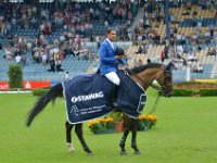 2012 - Eroeffnung des Weltfestes fuer Pferdesport im Sportpark Soers in Aachen. Sieger des STAWAG Preises Alvaro Miranda mit Pferd Rahmannofs Bogeno : Aachen, Alvaro, Eroeffnung, Miranda, Pferd, Pferdesport, Rahmannofs Bogeno, STAWAG Preis, Sieger, Soers, Sportpark, Weltfest fuer Pferdesport